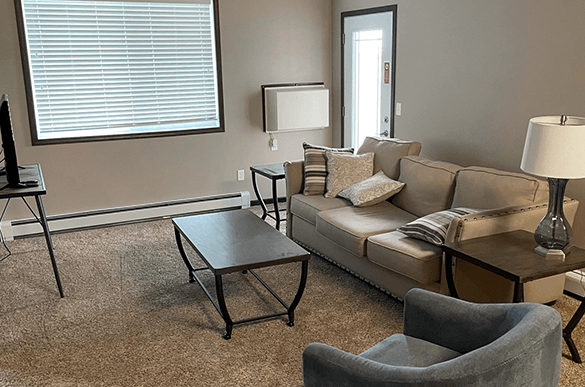 a living room with a couch and a coffee table