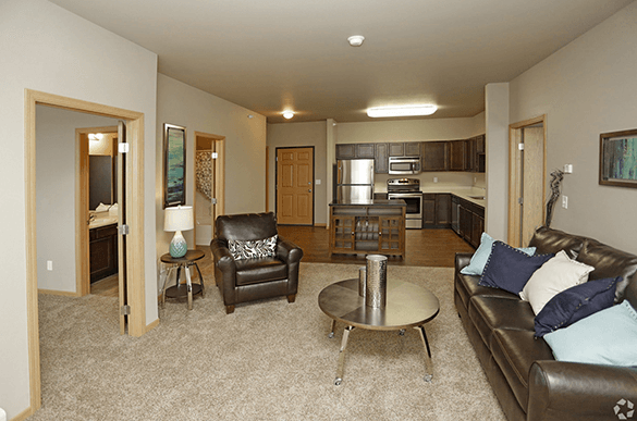 a living room with a couch and a table