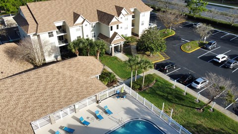 an aerial view of a house with a pool in front of it at Tivoli Apartments of Orlando, Oviedo, 32765