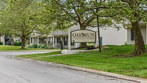 a building with a sign that reads oak run community center at Oak Run Apartment Homes, Ohio