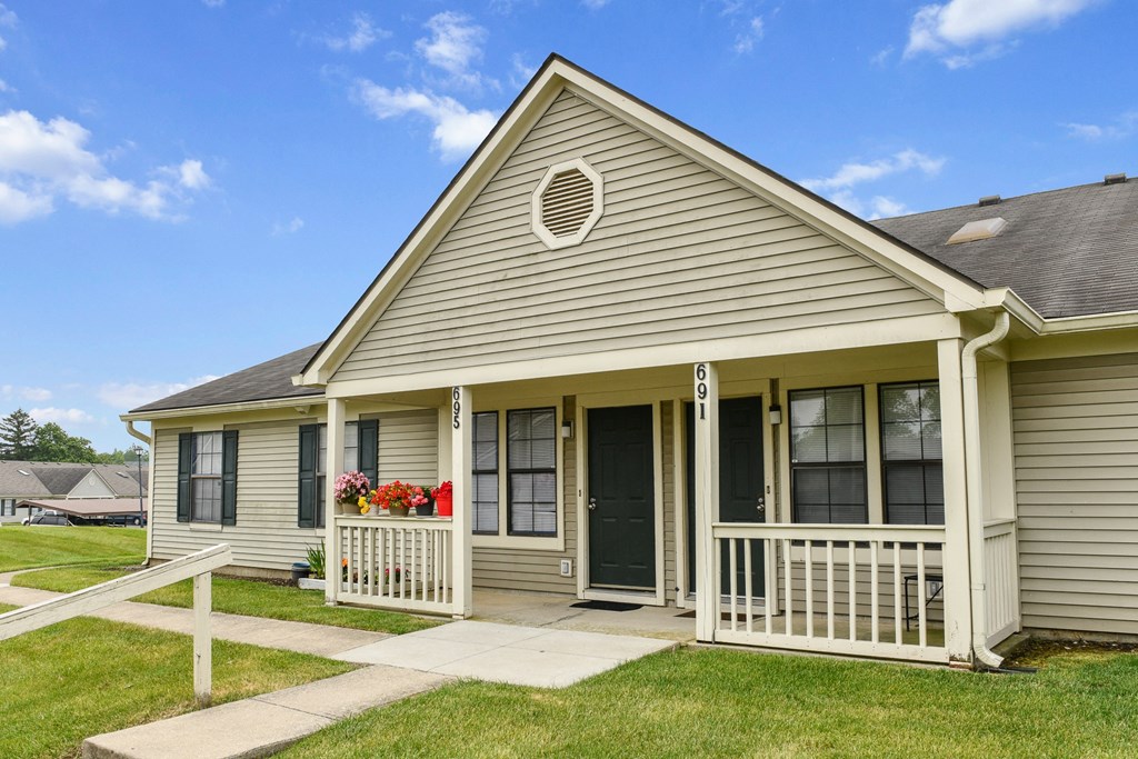 a manufactured home with a porch and a porch swing at Oak Run Apartment Homes, Ohio