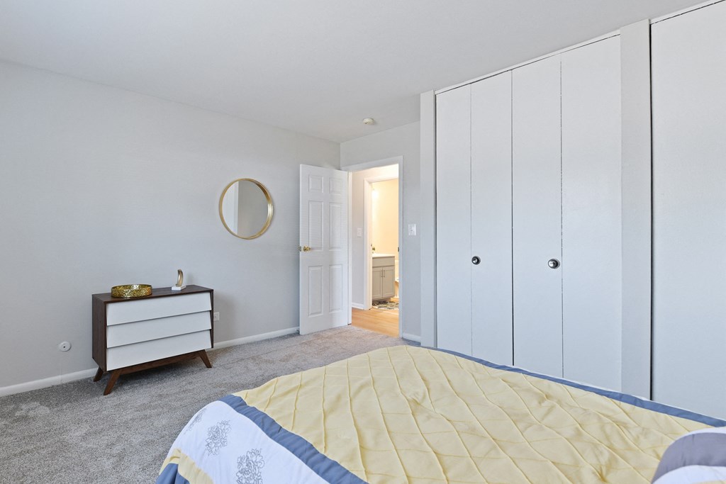 Spacious master bedroom with large closets for plenty of storage at Aspen Ridge Apartments, West Chicago, 60185