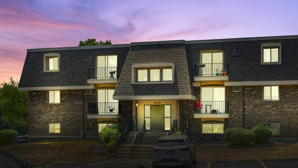 Exterior twilight view at Aspen Ridge Apartments in West Chicago Illinois 60185