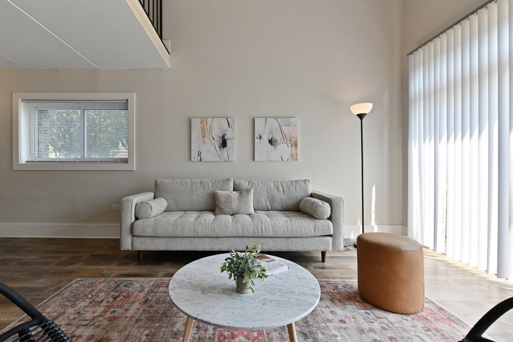a living room with a couch and a coffee table at Fox Run Apartments, St. Charles, Illinois