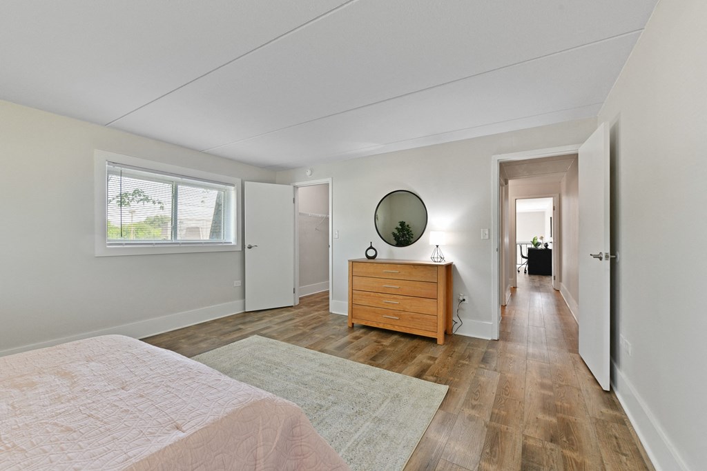 Private master bedroom with large walk in closet and extra windows for plenty of natural light at Fox Run Apartments in St Charles IL 60174