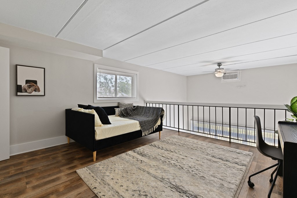 An open loft, perfect for a bedroom, guest room, or work from home office space at Fox Run Apartments in St Charles IL 60174