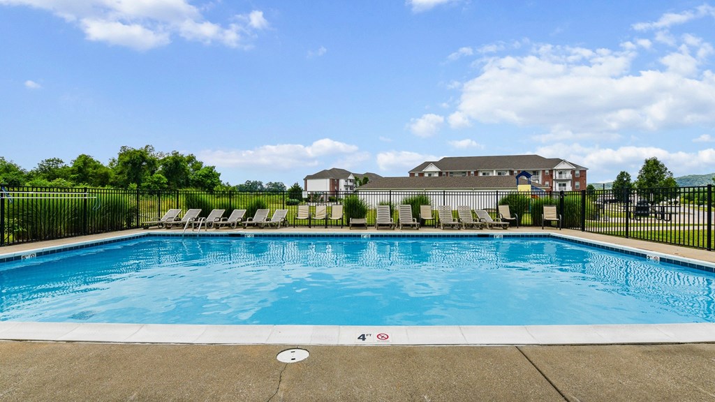 Swimming pool with lounge area and seating at The Reserves of Thomas Glen, Shepherdsville, KY, 40165