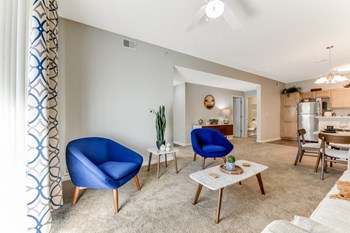Corner sideview of a blue chair in the living room - Photo Gallery 12