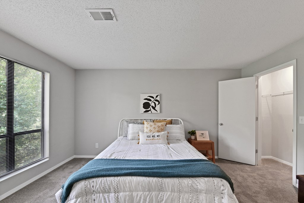 the preserve at ballantyne commons bedroom with bed and window