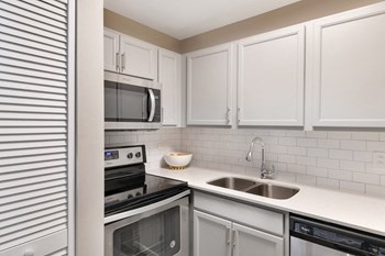 Renovated Kitchen Quartz Countertops at The Ponds of Naperville, Naperville, Illinois - Photo Gallery 2