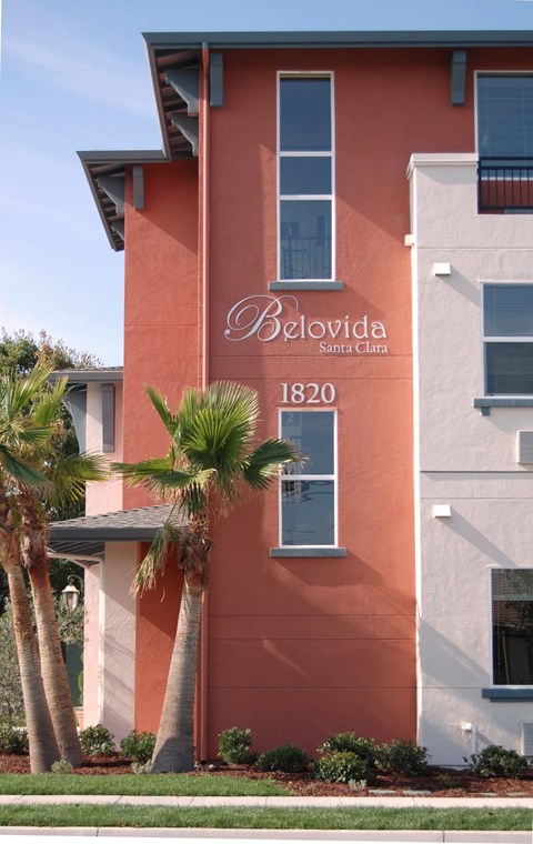 A red building with the name Ozlovida Santa Clara 1820 on it.