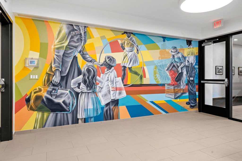 a mural on the wall of a room with columns