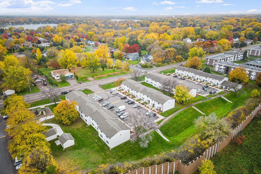 A view of a campus with a mix of trees and buildings.