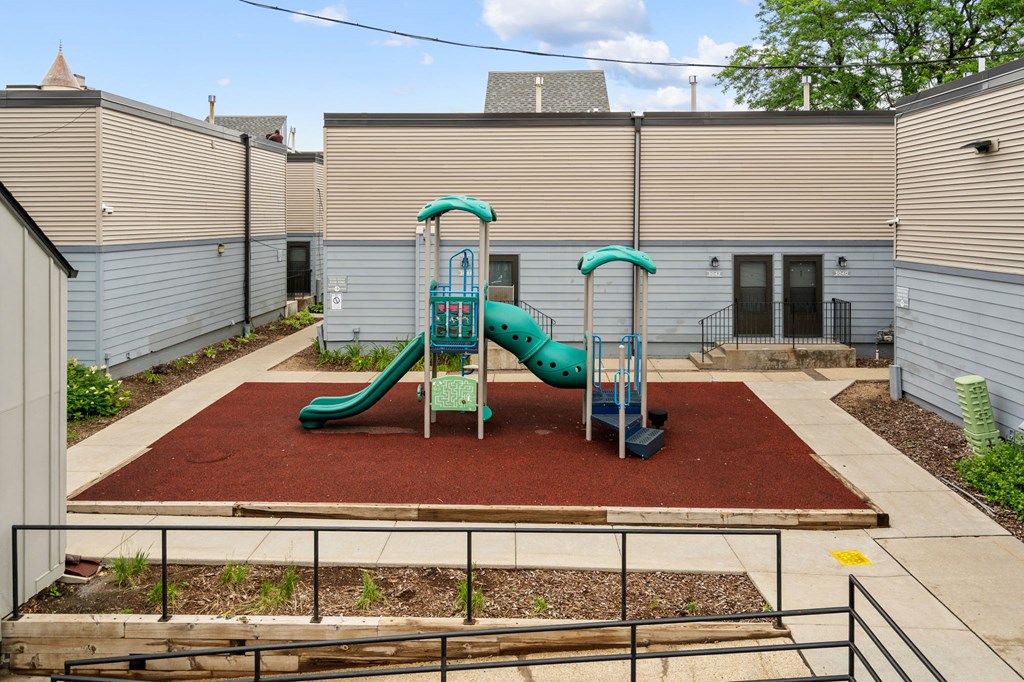 our playground is located in the back yard of our apartments