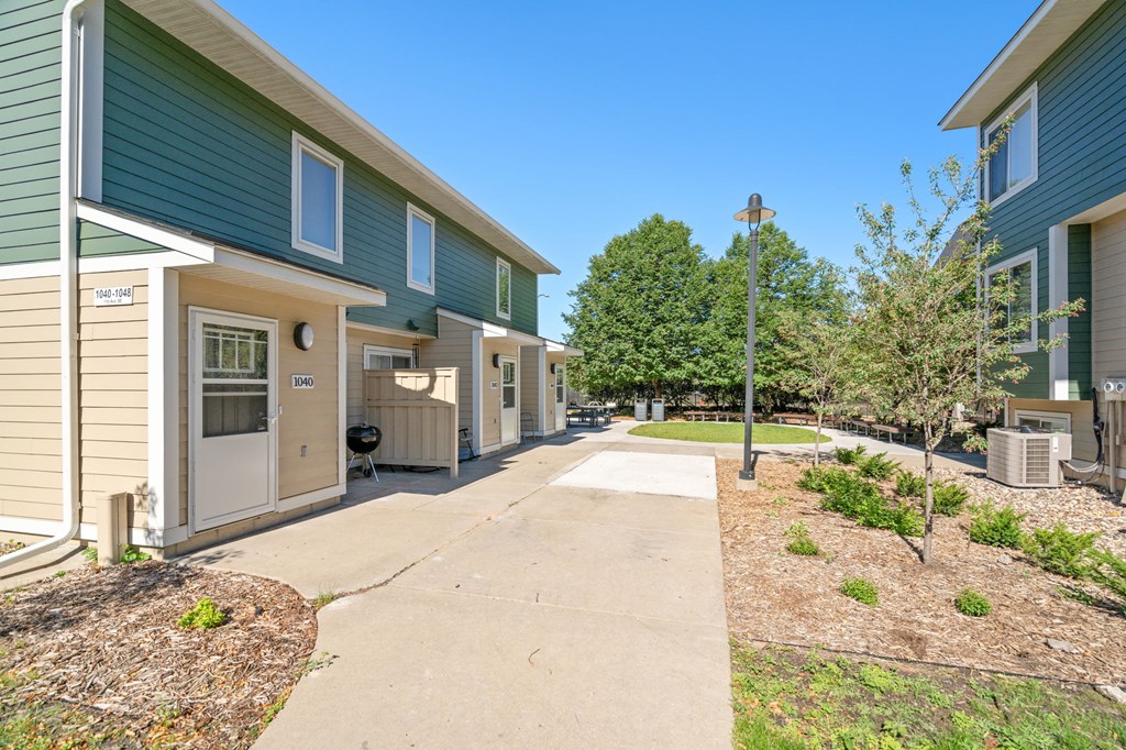 the preserve at ballantyne commons walkway between apartment buildings