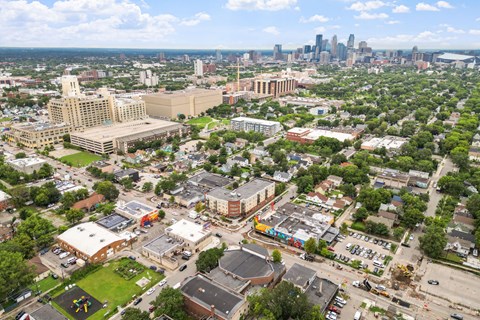 an aerial view of the city with the skyline in the background