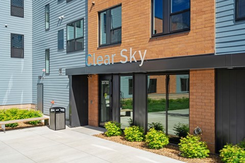 The front of a building with the name "Clear Sky" on it.