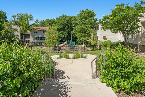 an image of a skate park with a ramp and stairs