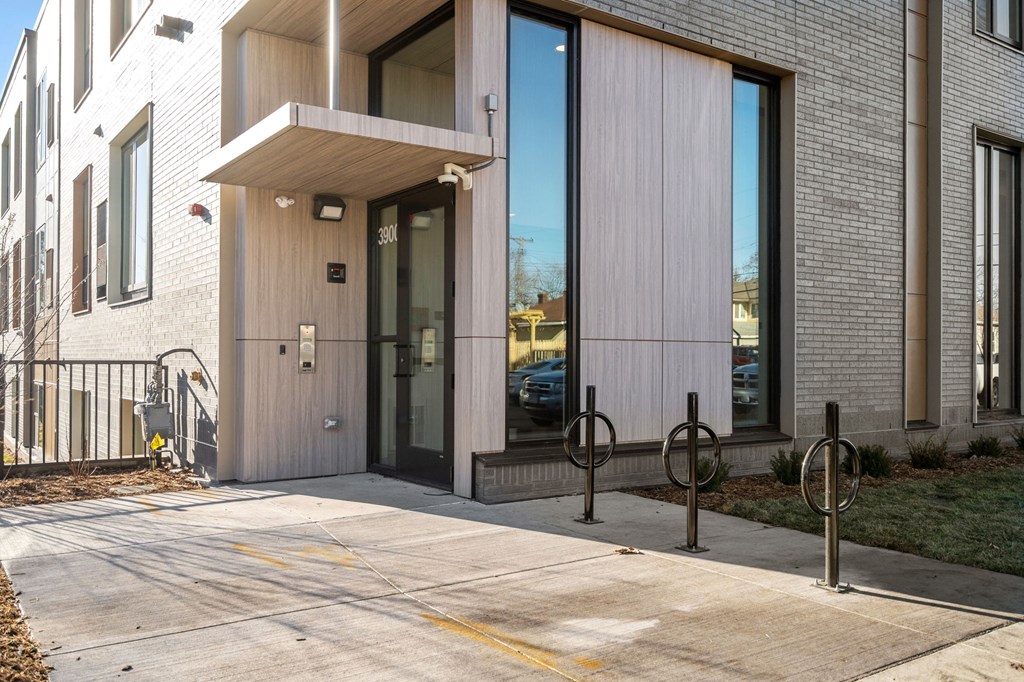 the entrance to a building with a glass door