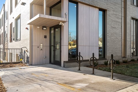 the entrance to a building with a glass door