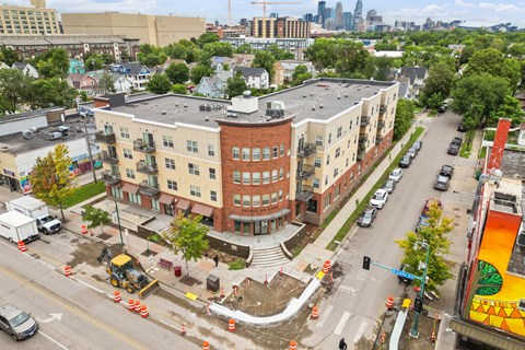 an overhead view of a building with a construction site