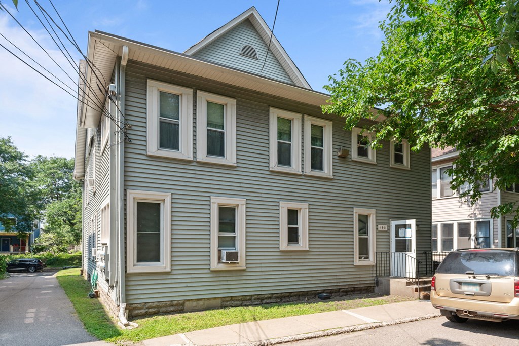 a house with a car parked in front of it