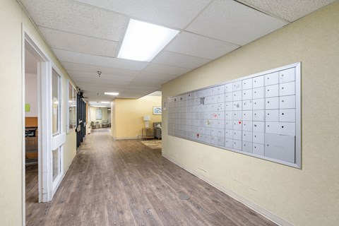 a long hallway with a calendar on the wall