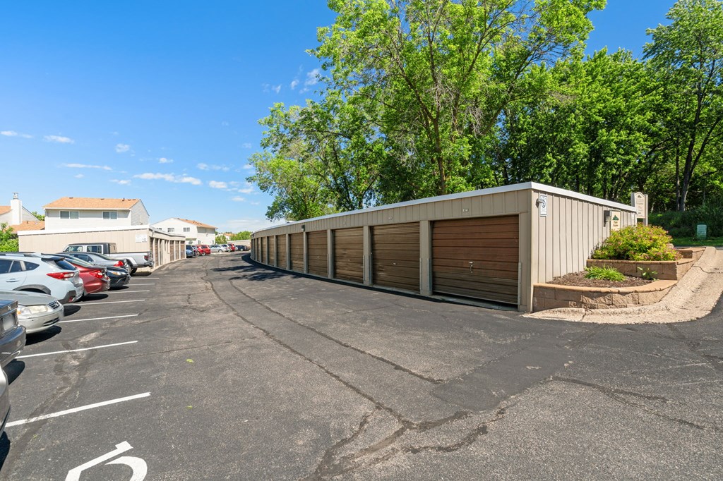 a long parking lot with a long garage door