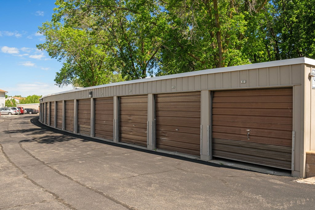 a row of garage doors on the side of a building