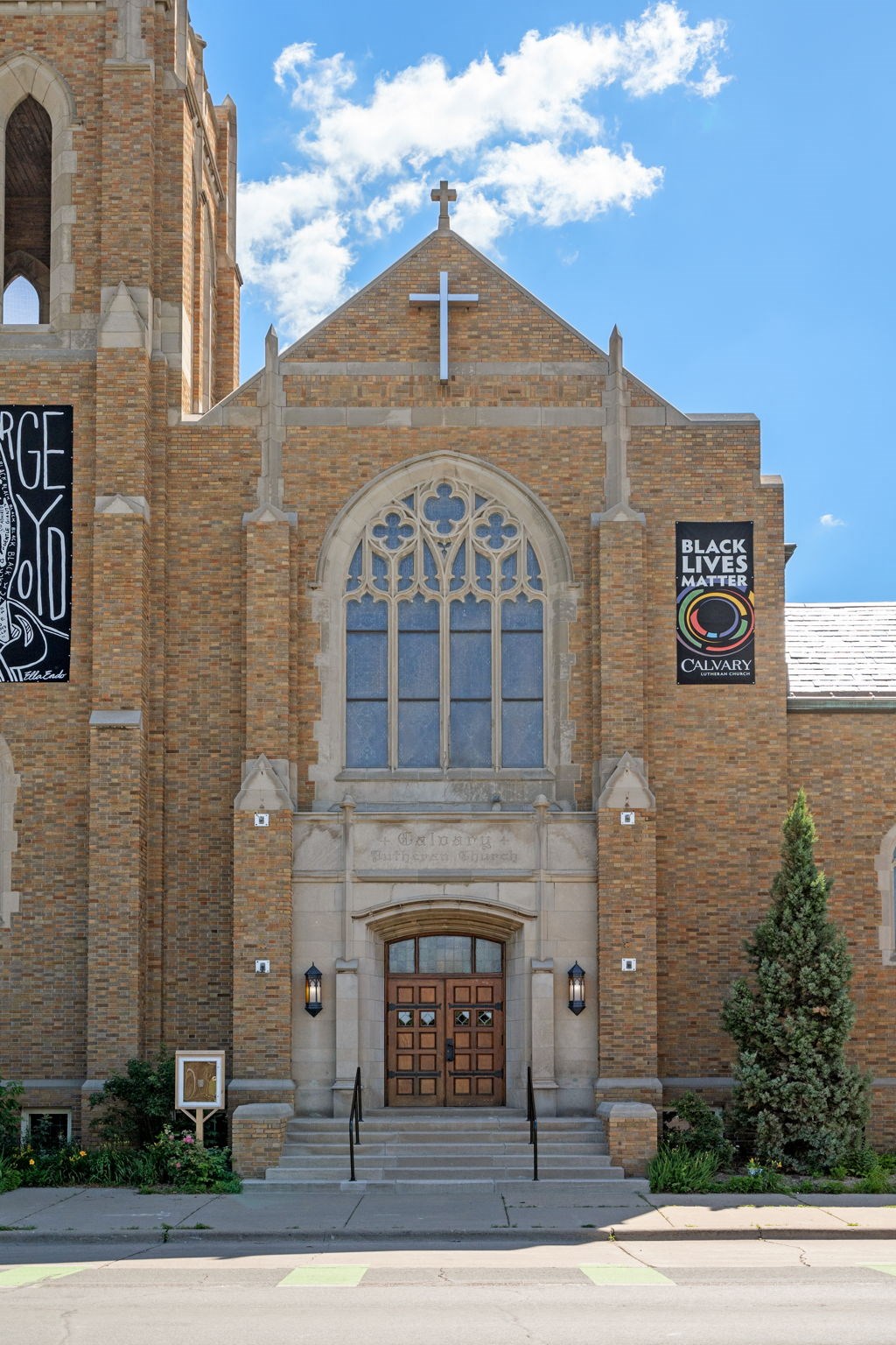 a church with a cross on the front of it