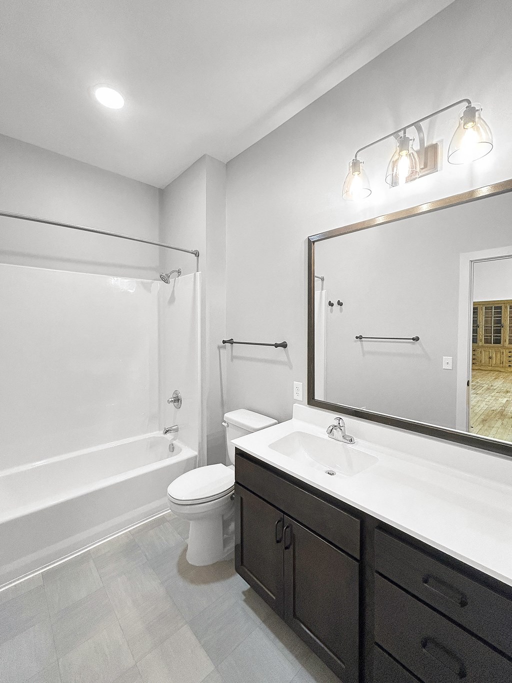 a bathroom with a sink toilet and a shower