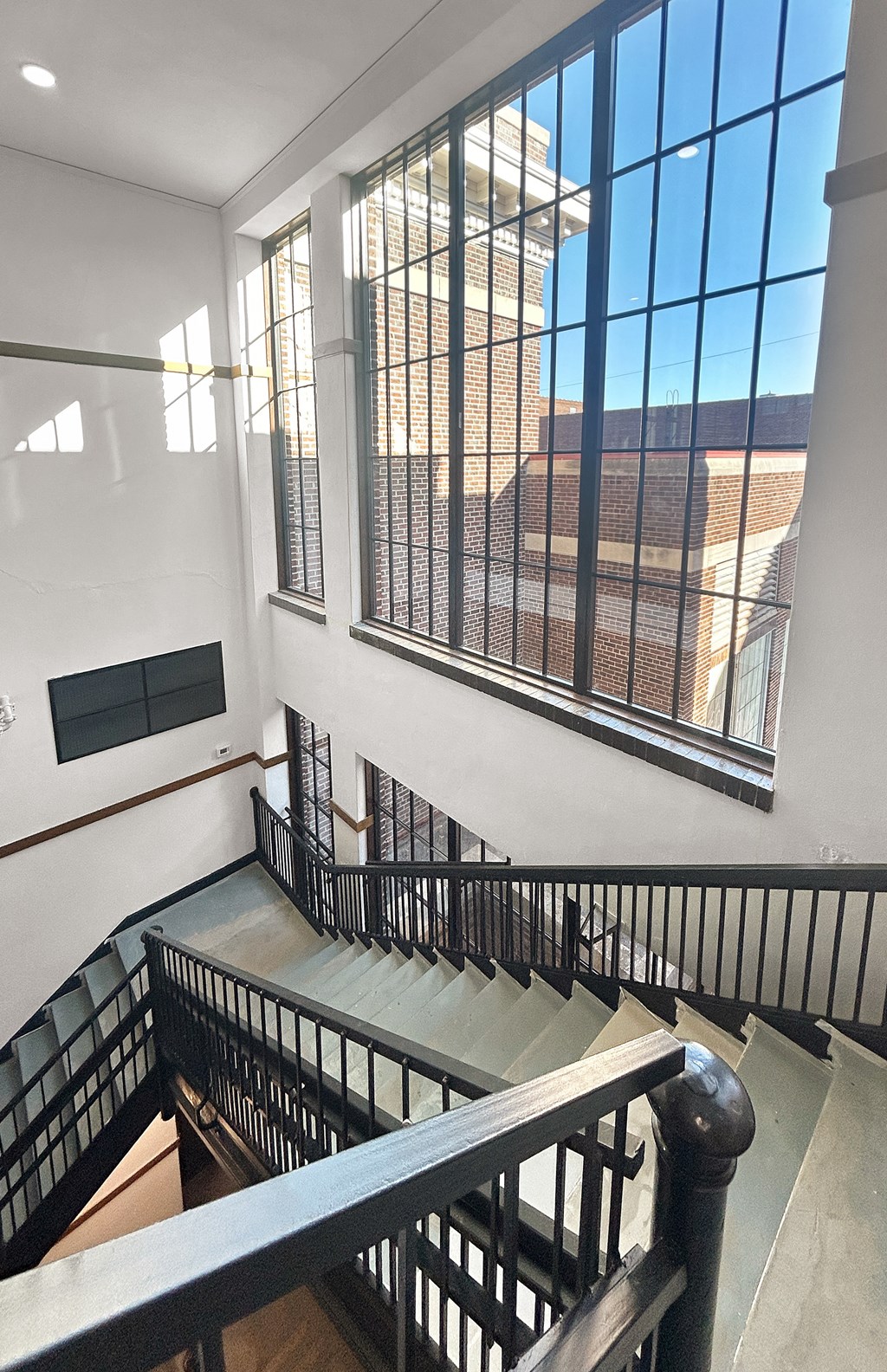 a view of a building from the top of a staircase