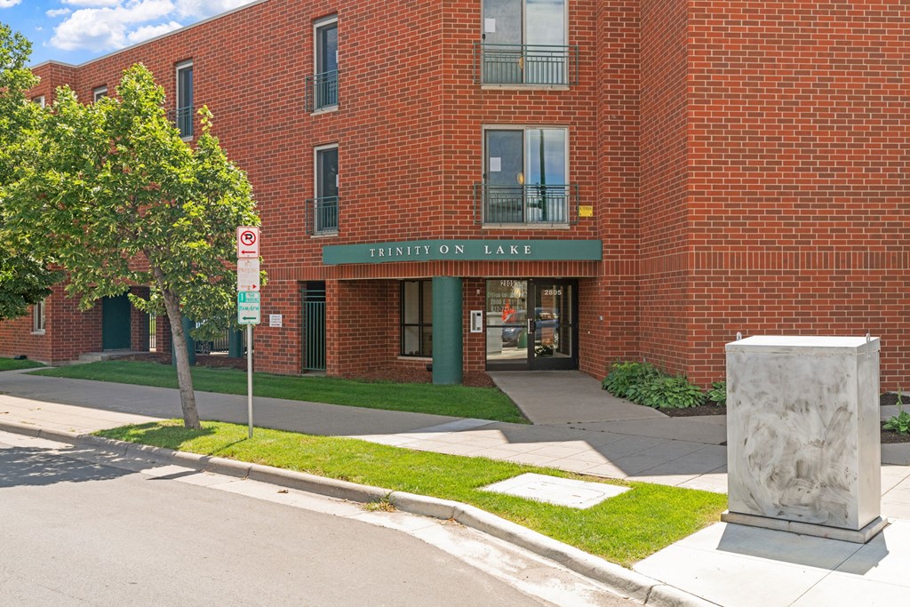 a brick building with a sign that reads