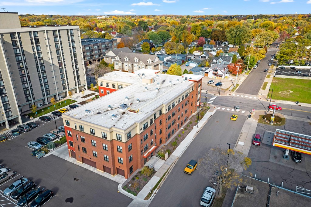 an aerial view of a building with a roof on top of it