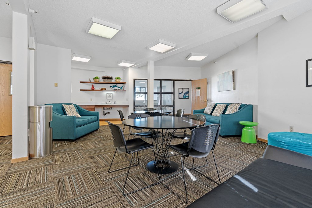 Party room with a round table and chairs