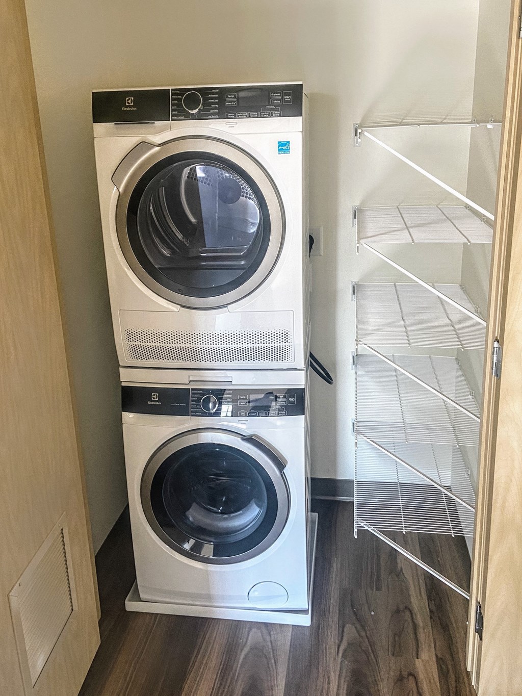 a washing machine and dryer in a laundry room