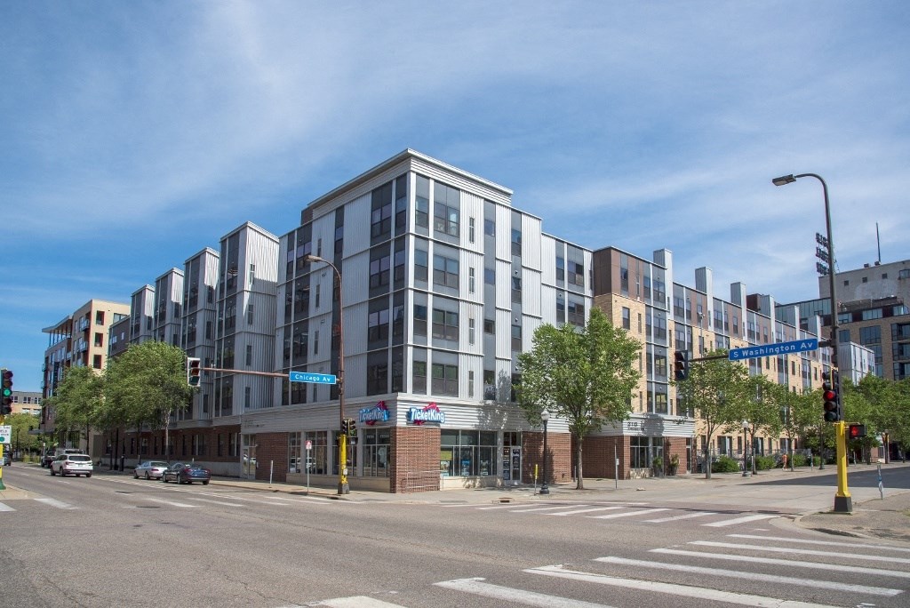 a modern building on the corner of a city street