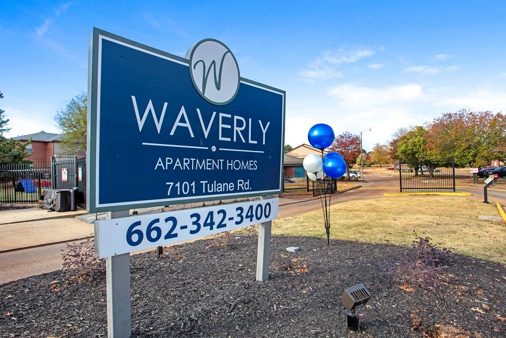 a sign that says waverly apartments