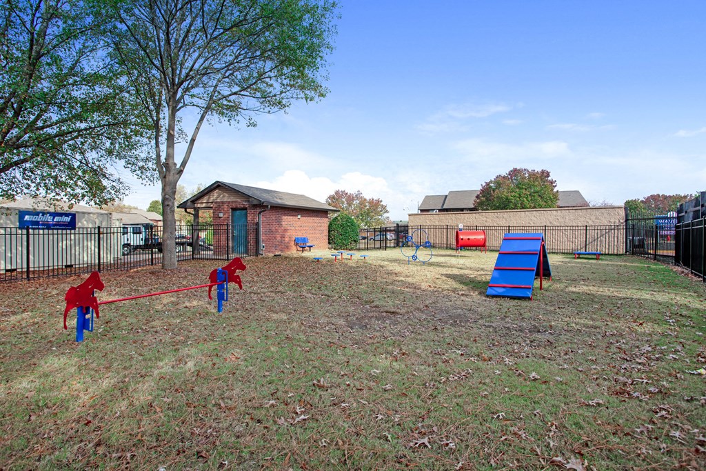 our apartments showcase a dog park with plenty of room to run and play