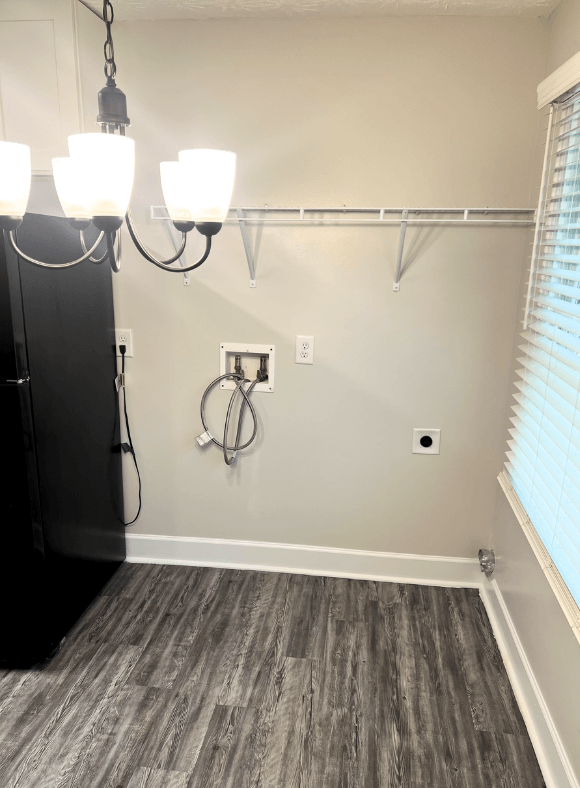 a bedroom with a medium sized closet and a window