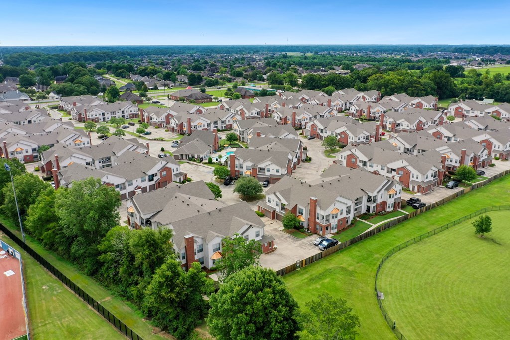a large group of houses in a suburb