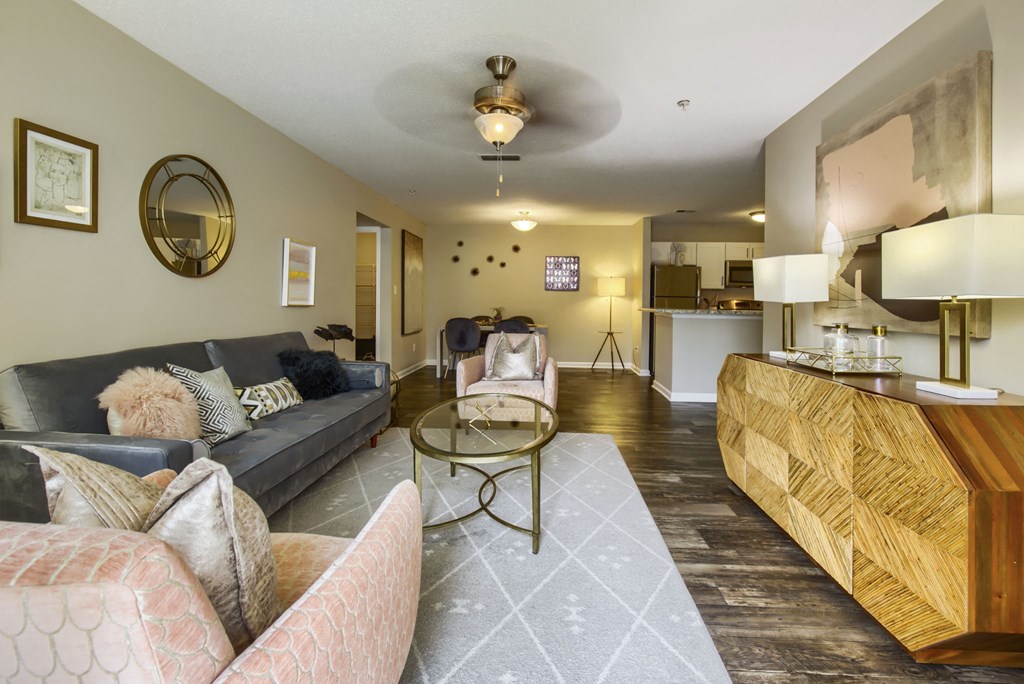 a living room with couches and a coffee table
