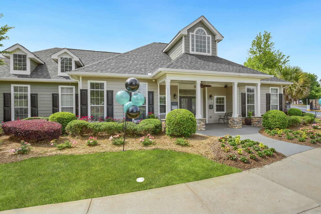 leasing office with a balloon in front of it