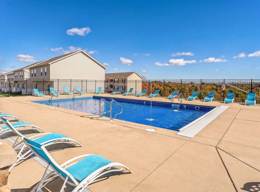 our apartments have a large pool and lounge chairs