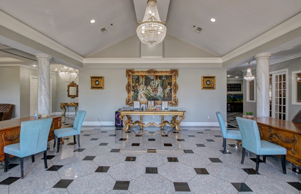 A dining room with a checkered floor and a chandelier.