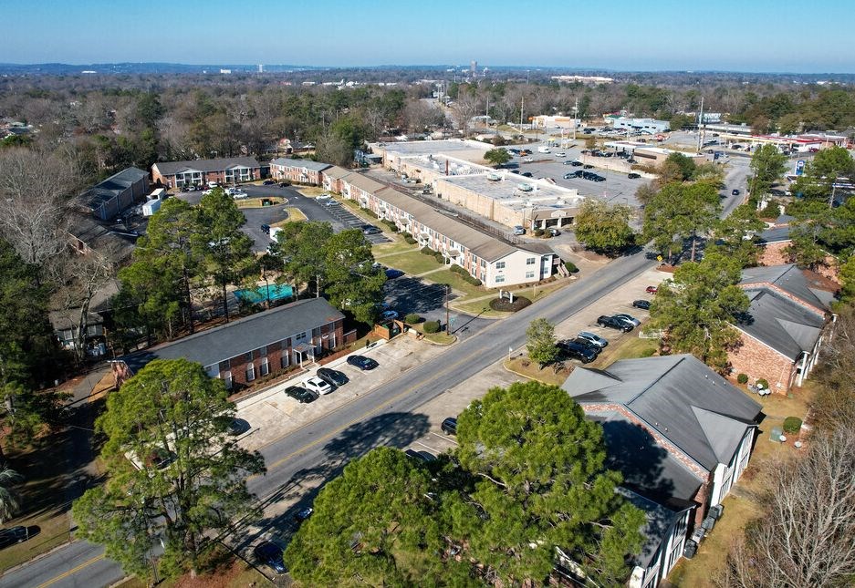 an aerial view of a city street and buildings