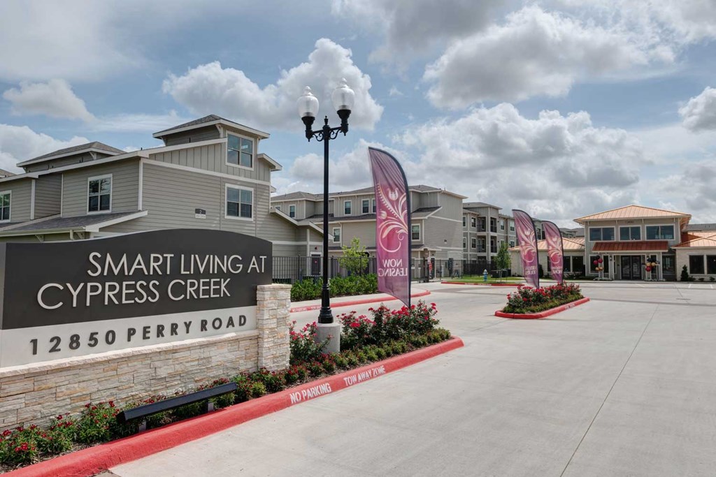 Front sign and gate at Smart Living at Cypress Creek