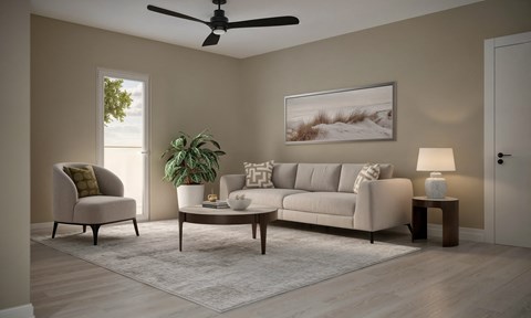 a living room with a couch and a chair and a rug