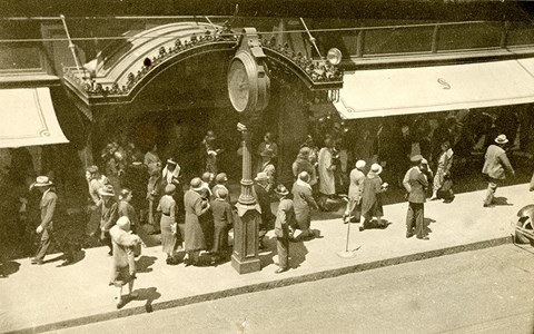 Crowd on Sidewalk