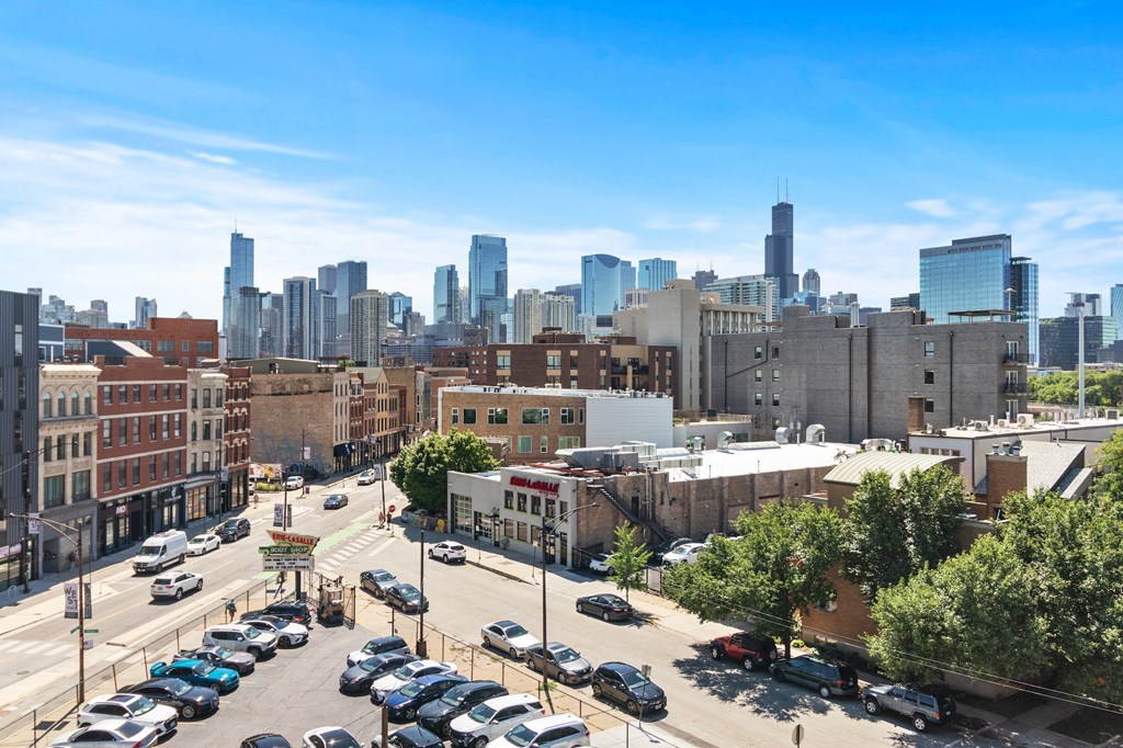 a view of the skyline from a parking lot